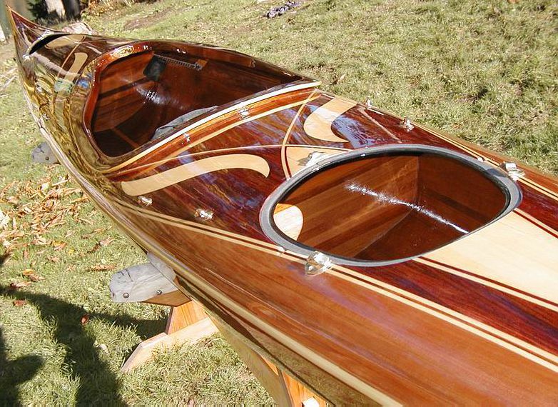 The complex marquetry are all solid wood inlays carved in the cedar 