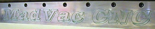 MadVac engraving on aluminium Y axis cover plate